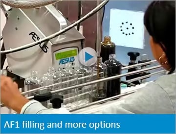 FILLERS Manual filler More about 3.jpg Aesus Packaging Systems