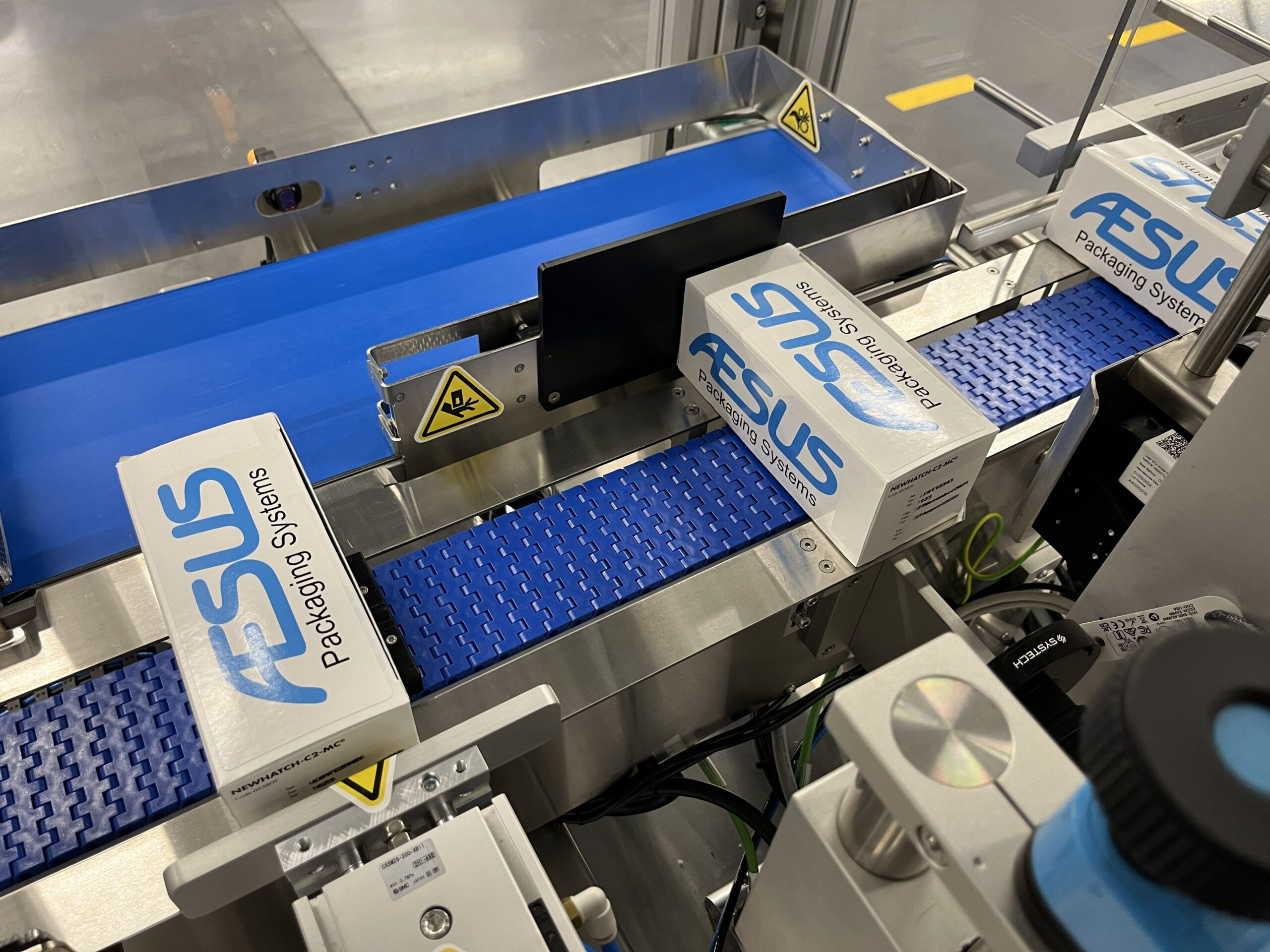 Product Handling • Conveyors • Turn Tables • BiFlow Tables • Aesus 6 Aesus Delta Chup Cap Illustration