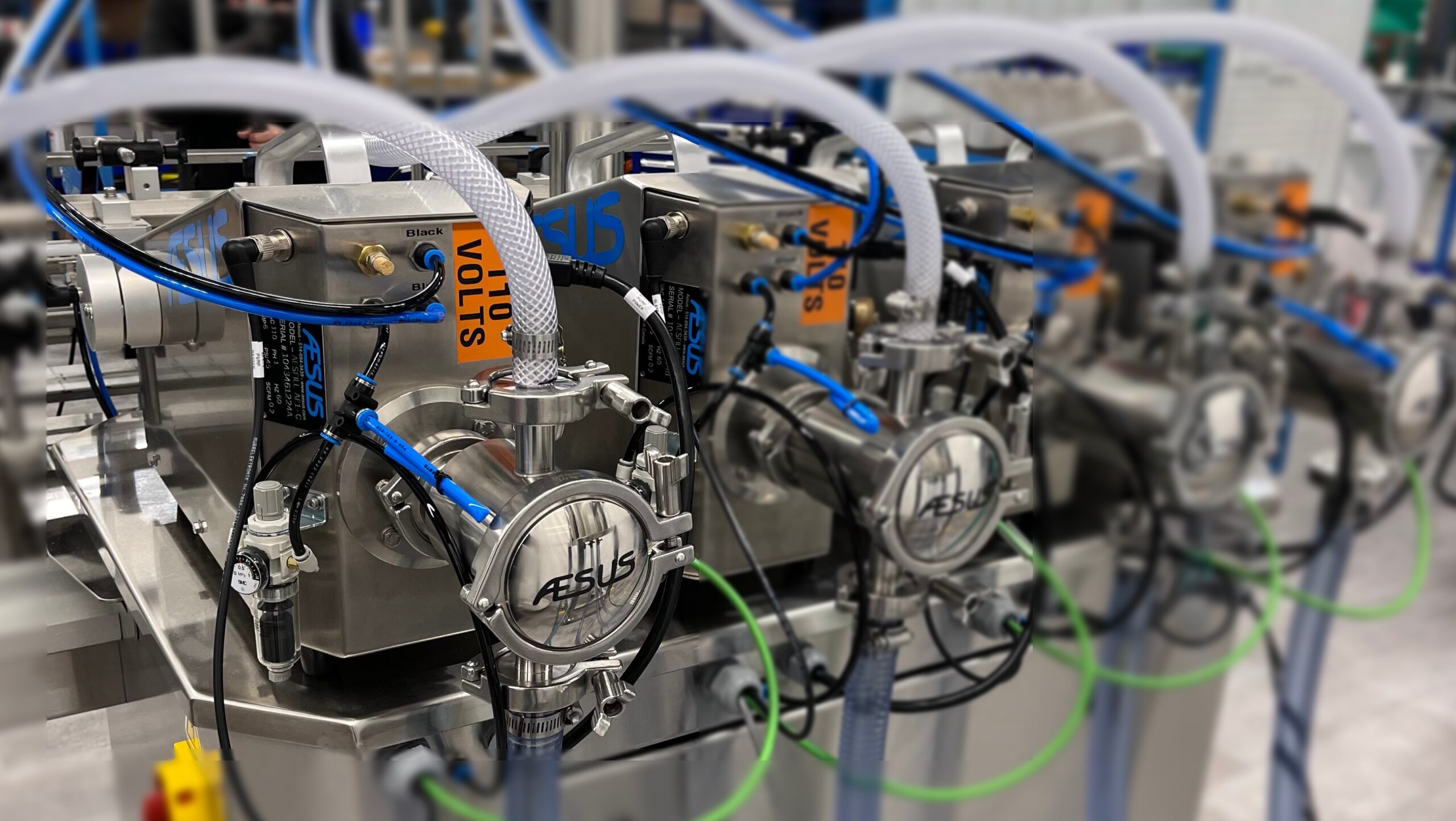 Liquid Fillers Automatic • AESFill AF4 to AF12 • Liquid Filling Machines • Aesus 3 Filler AutoKit Rear 4AF1s Blurred scaled Aesus